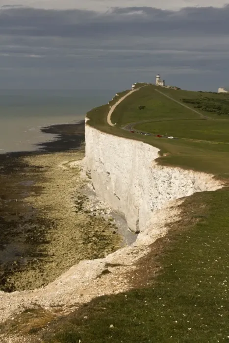 Framed Print : Beachy Head looking west over the old Belle Tout Lighthouse. This is a chalk headland on the south coast of England