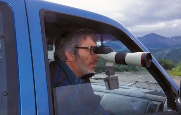 Framed Print : Birdwatching Derek Moore using a Nikon Telescope Framed Print : Birdwatching Derek Moore using a Nikon Telescope