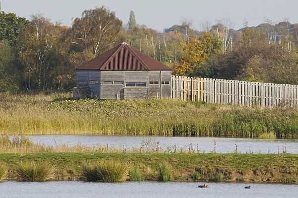 Birdwatching hide overlooking reedbed and wetland habitat, Potteric Carr Nature Reserve, South Yorkshire, England