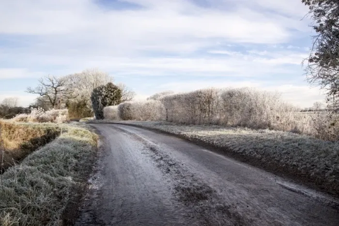 Framed Print : Black ice, sometimes called clear ice, refers to (a thin coating of glazed ice on a Road surface)
