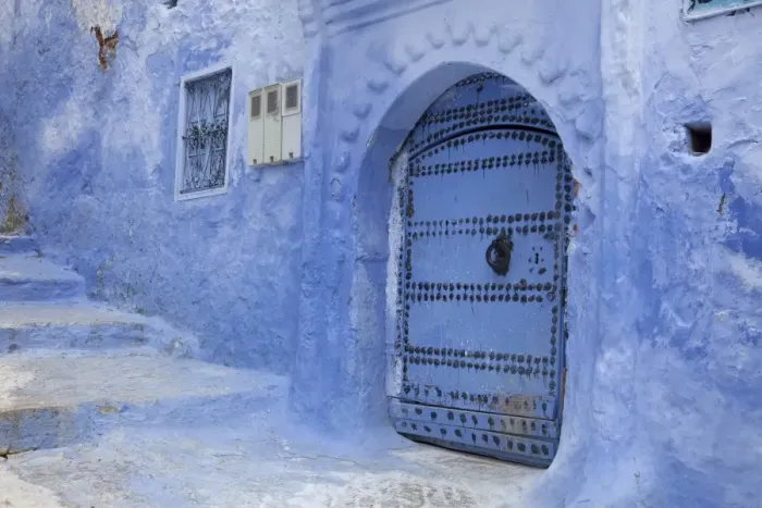 Framed Print : Blue door and stairway in alley of city, Chefchaouen, Morocco, april Framed Print : Blue door and stairway in alley of city, Chefchaouen, Morocco, april