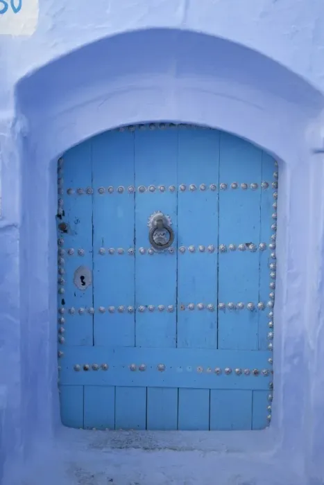 Framed Print : Blue door in street of city, Chefchaouen, Morocco, april Framed Print : Blue door in street of city, Chefchaouen, Morocco, april