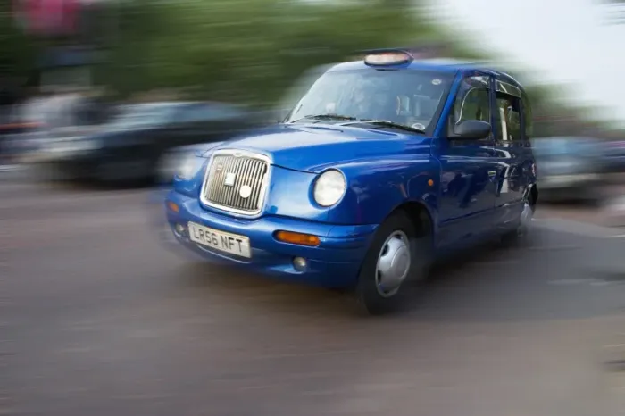 Framed Print : Blue taxi on city road, The Mall, City of Westminster, London, England, april