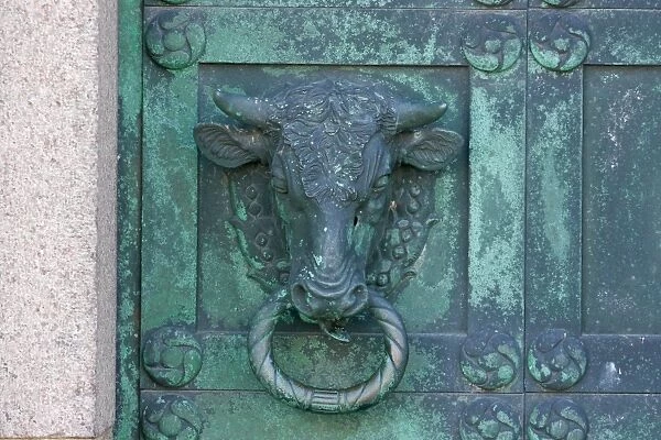 Bull head detail of bronze cathedral door in historic town, Our Lady Maria Cathedral (Vor Frue Maria Domkirke), Ribe