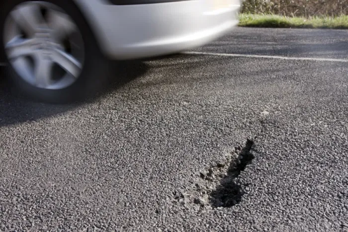 Framed Print : Car avoiding pothole caused by floods, Aldingbourne, near Bognor Regis, West Sussex, England, February 2014 Framed Print : Car avoiding pothole caused by floods, Aldingbourne, near Bognor Regis, West Sussex, England, February 2014