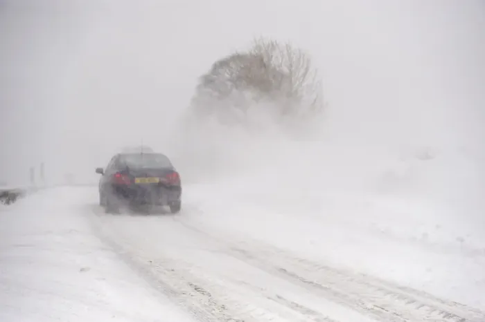 Framed Print : Car travelling along rural road during severe snowstorm, A685, near Ravenstonedale, Cumbria, England, March Framed Print : Car travelling along rural road during severe snowstorm, A685, near Ravenstonedale, Cumbria, England, March