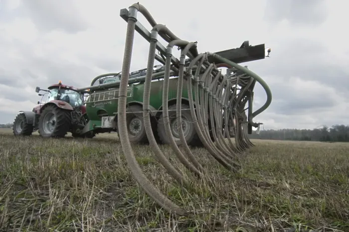 Framed Print : Case 225 tractor with Samson vacuum slurry tanker and slurry injector, injecting slurry into stubble field, Sweden, may