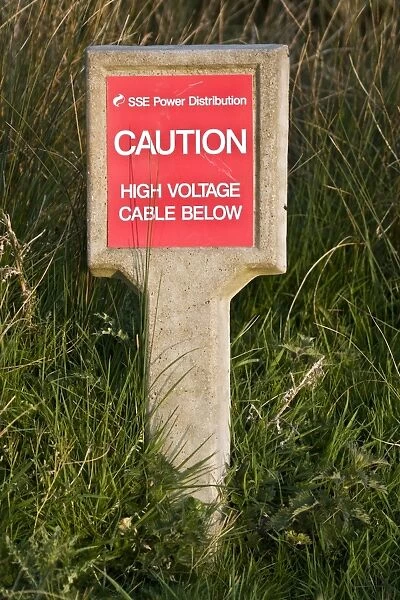 Caution, High Voltage Cable Below underground cable warning sign, Dorset, England, april