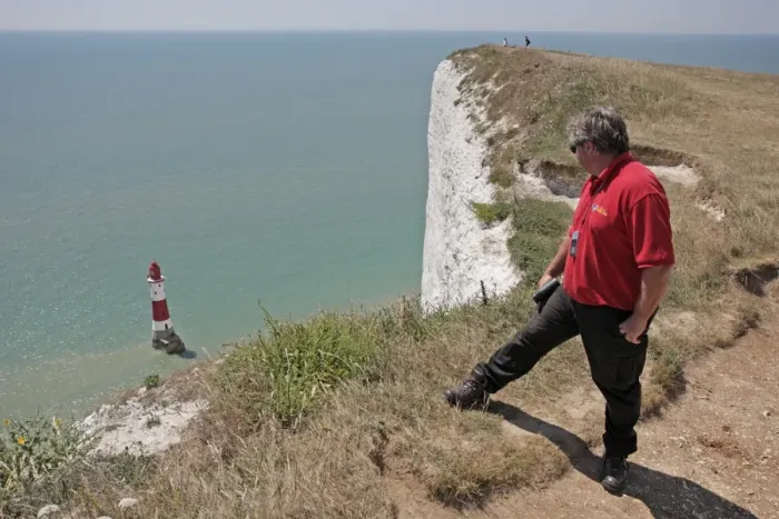 Framed Print : Chaplain on patrol in attempt to find and stop any potential jumpers at infamous clifftop suicide spot Framed Print : Chaplain on patrol in attempt to find and stop any potential jumpers at infamous clifftop suicide spot