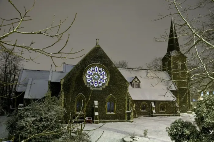 Framed Print : Church in snow at night, with interior lights shining through stained glass window, All Saints Church, Belvedere Framed Print : Church in snow at night, with interior lights shining through stained glass window, All Saints Church, Belvedere