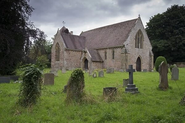 Churchyard and 13th century Anglican parish church, St. Marys Church, Acton Burnell, Shropshire, England, August