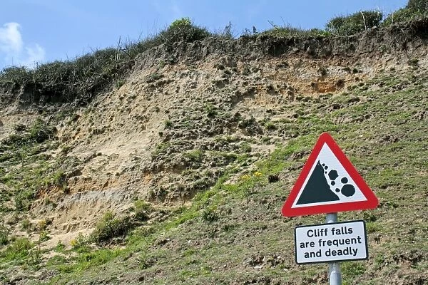 Cliff falls are frequent and deadly sign beside coastal cliff erosion, Dunwich, Suffolk, England, july