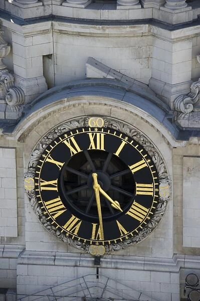 Clock on clock tower of city cathedral, St. Pauls Cathedral, City of London, London, England, april