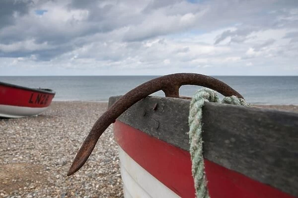 Close-up of anchor in fishing boat on shingle beach, Cley, Norfolk, England, september