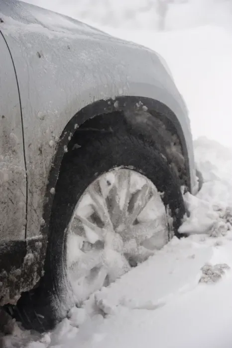 Framed Print : Close-up of car wheel stuck in snowdrift after snowstorm, Cumbria, England, March Framed Print : Close-up of car wheel stuck in snowdrift after snowstorm, Cumbria, England, March