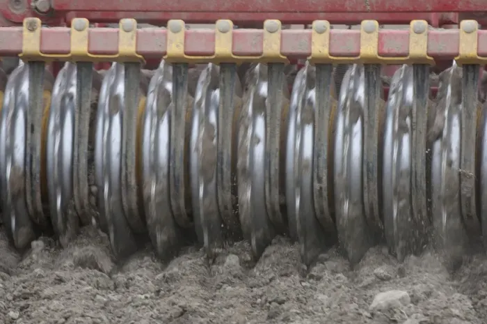 Framed Print : Close-up of disc harrows, cultivating arable field, Sweden, may Framed Print : Close-up of disc harrows, cultivating arable field, Sweden, may