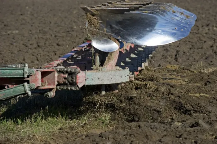 Framed Print : Close-up of reversible plough, ploughing arable field, Sweden, september Framed Print : Close-up of reversible plough, ploughing arable field, Sweden, september