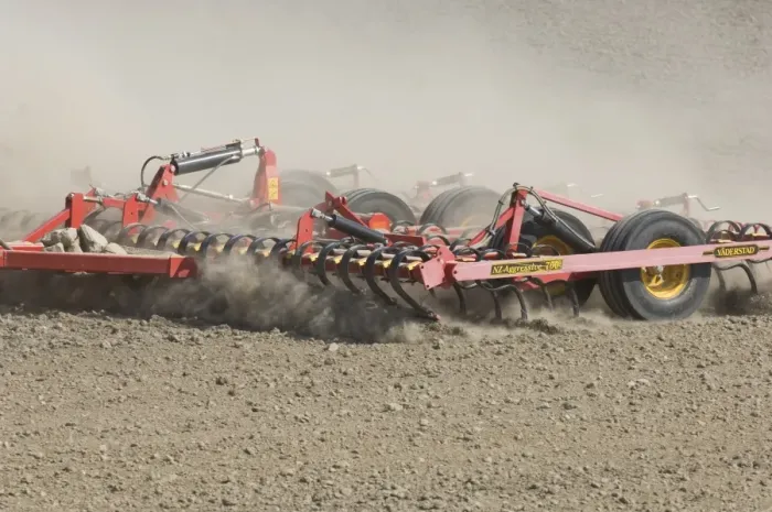 Framed Print : Close-up of Vaderstad cultivator, cultivating arable seedbed, in dusty ploughed field, Sweden