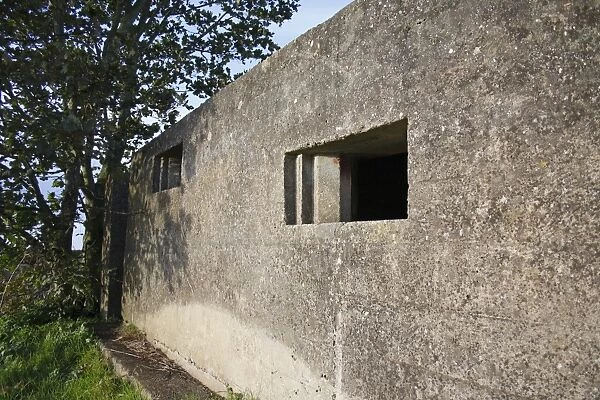Close-up of World War Two FW3 Type 23 pillbox, in evening sunshine, Stowupland, Suffolk, England, october