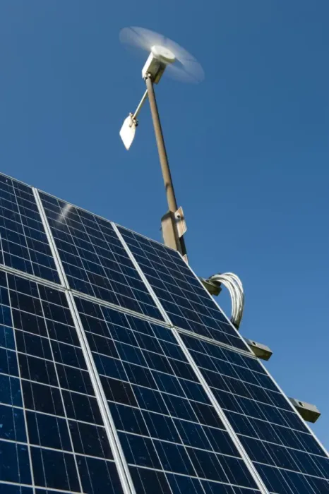 Framed Print : Combination of solar panels and wind turbine, harnessing renewable energy to produce electricity at remote reservoir Framed Print : Combination of solar panels and wind turbine, harnessing renewable energy to produce electricity at remote reservoir