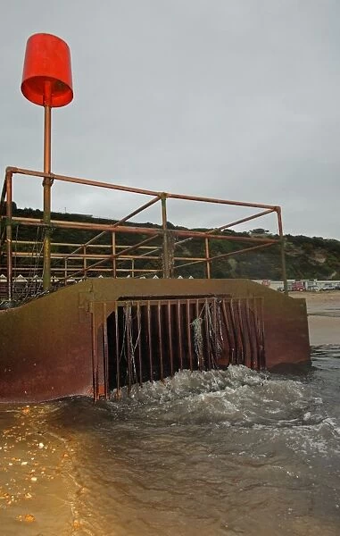 Combined sewer overflow (CSO), sanitary sewage and stormwater runoff discharged onto beach, Boscombe, Dorset, England