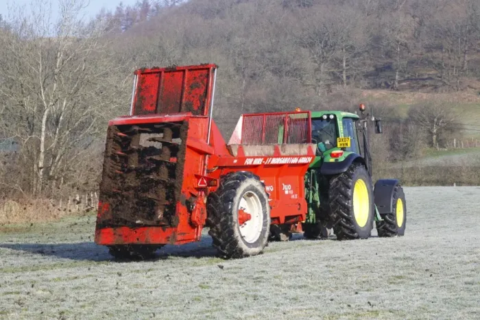 Framed Print : Contractor with John Deere 6520 tractor and K-two Duo muckspeader spreading farmyard manure Framed Print : Contractor with John Deere 6520 tractor and K-two Duo muckspeader spreading farmyard manure