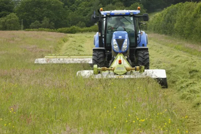 Framed Print : Contractor with New Holland T6080 tractor with front and rear mounted Cls mowers Framed Print : Contractor with New Holland T6080 tractor with front and rear mounted Cls mowers