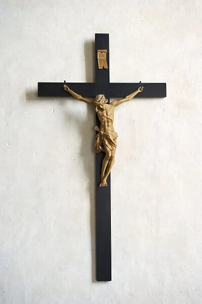 Crucifix on cathedral wall, Strangnas Cathedral, Sodermanland, Sweden, august