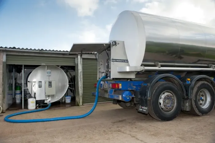 Framed Print : Dairy farming, milk being collected off farm in tanker, England, november Framed Print : Dairy farming, milk being collected off farm in tanker, England, november