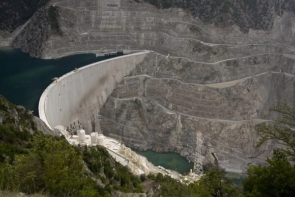 Dam under construction in area currently being heavily dammed, Coruh River Valley (Coruh Nehri), Anatolia, Turkey, July