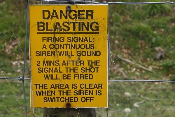 Danger, Blasting warning notice beside worked out quarry, Wenlock Edge, Shropshire, England, April