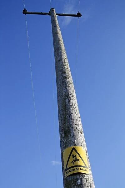 Danger of Death warning sign, on pole of overhead powerlines, Suffolk, England, october