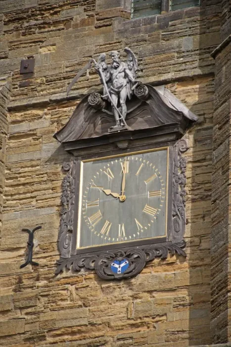 Framed Print : Decorative clock with Old Father Time on church tower, Cranbrook, Kent, England, august Framed Print : Decorative clock with Old Father Time on church tower, Cranbrook, Kent, England, august