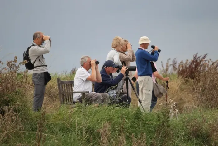 Framed Print : Elderly birdwatchers with binoculars and telescope, Titchwell RSPB Reserve, Norfolk, England, September Framed Print : Elderly birdwatchers with binoculars and telescope, Titchwell RSPB Reserve, Norfolk, England, September