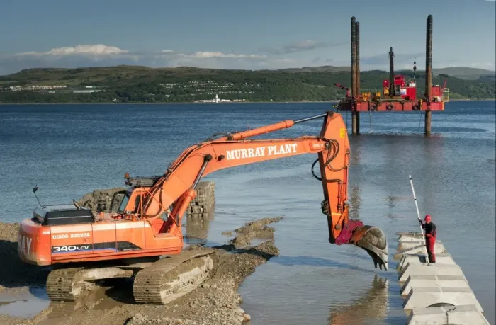 Framed Print : Excavator building sea defences, Dunoon, Firth of Clyde, Argyll and Bute, Scotland, august