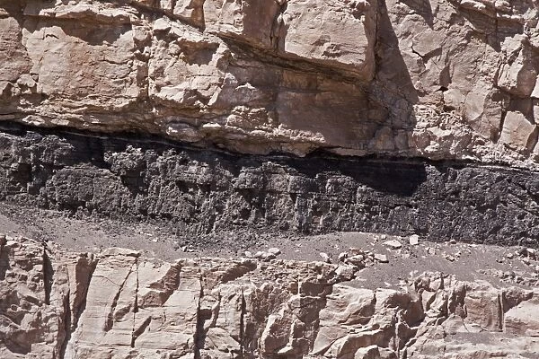 Exposed Bituminous coal seams in Utah # America. Bituminous coal is a dense sedimentary rock
