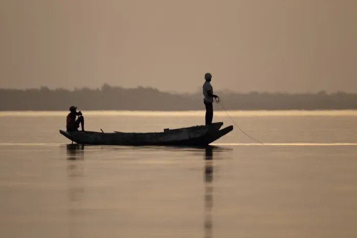 Framed Print : Fishermen in boat on river at sunset, River Gambia, Tendaba, Gambia, february Framed Print : Fishermen in boat on river at sunset, River Gambia, Tendaba, Gambia, february