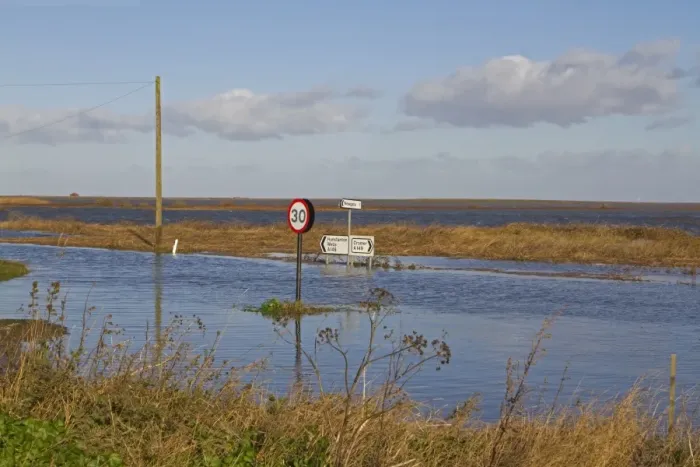 Framed Print : Flooded coast road and marshes after tidal surge, Cley-next-the-sea, North Norfolk, England, December 2013 Framed Print : Flooded coast road and marshes after tidal surge, Cley-next-the-sea, North Norfolk, England, December 2013