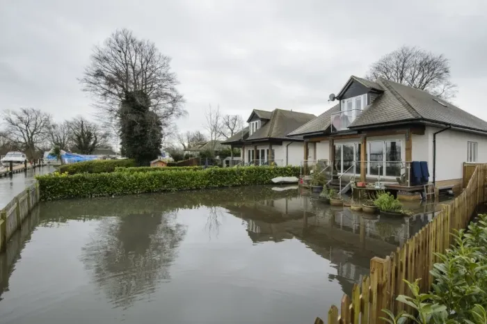 Framed Print : Floodwater in house garden during river flood, River Thames, Chertsey, Surrey, England, February 2014 Framed Print : Floodwater in house garden during river flood, River Thames, Chertsey, Surrey, England, February 2014