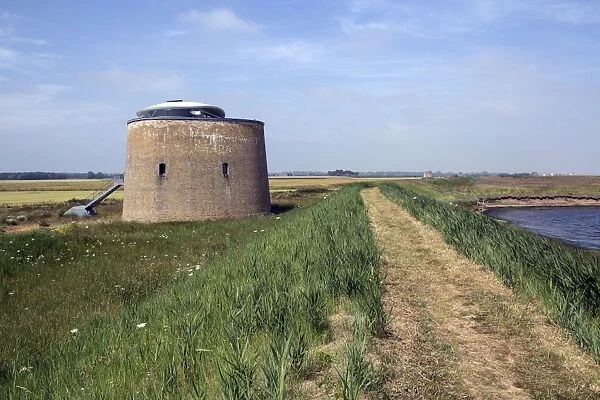 Foot path on sea wall looking towards Hollesley with Martellow Tower X -Suffolk