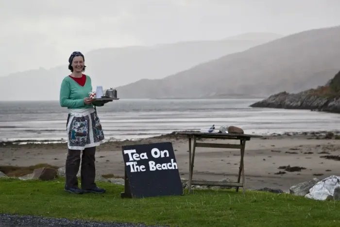 Framed Print : Georgina Kitching serving tea at Tea on the Beach, Inverlussa Bay, Isle of Jura, Inner Hebrides, Scotland Framed Print : Georgina Kitching serving tea at Tea on the Beach, Inverlussa Bay, Isle of Jura, Inner Hebrides, Scotland