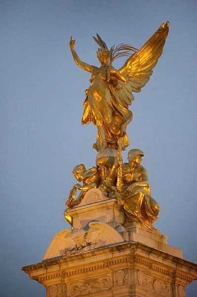 Gilded statue of Victory on pinnacle of memorial, Victoria Memorial, Queens Gardens, Buckingham Palace