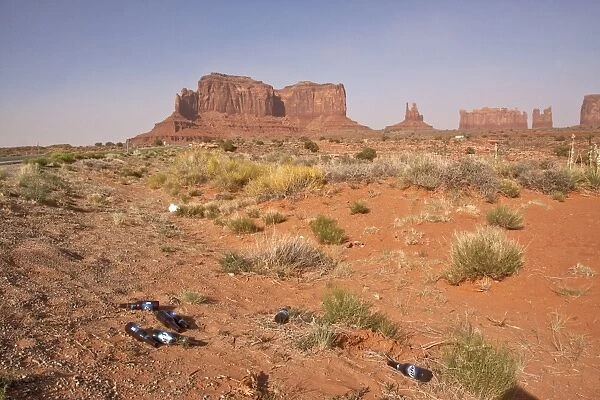 Glass bottle dumped by the side of the road, risk to wildlife and fire. Monument Valley Arizona