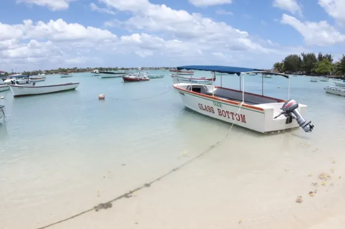 Framed Print : Glass Bottom tourist boat moored beside sandy beach, West Mauritius Framed Print : Glass Bottom tourist boat moored beside sandy beach, West Mauritius