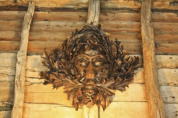 Green Man carved wooden face in barn, Museum of East Anglian Life, Stowmarket, Suffolk, England, october