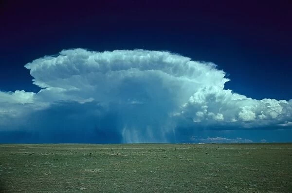 Hail storm anvil cloud tracking northeast across high plains, Northeast Colorado, U. S. A