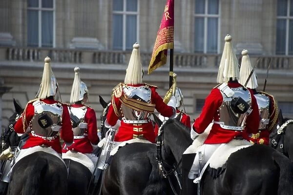 Household Cavalry mounted troopers in ceremonial uniforms, Changing of the Guard outside palace, Buckingham Palace