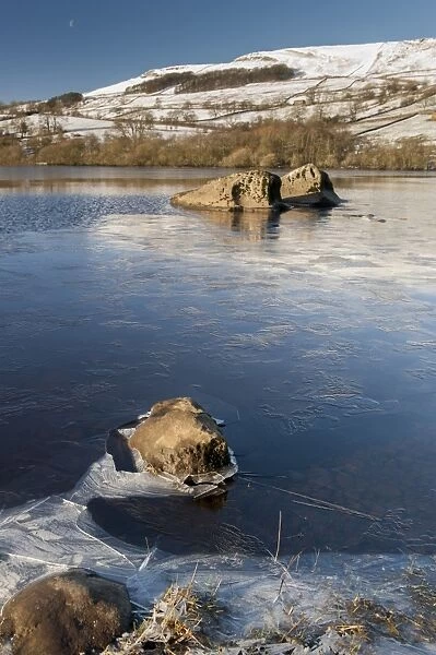 Ice forming around edge of lake, Semerwater, Wensleydale, Yorkshire Dales N. P. North Yorkshire, England, December