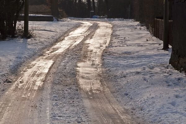 Ice on road from melted snow