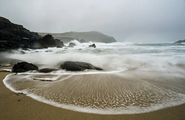 Incoming tide on beach, Clogher Bay, Clogher, Dingle Peninsula, County Kerry, Munster, Ireland, November